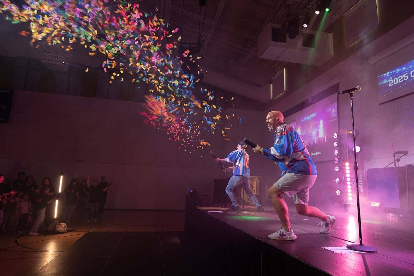 Go Fish firing confetti cannons over a crowd at a live show
